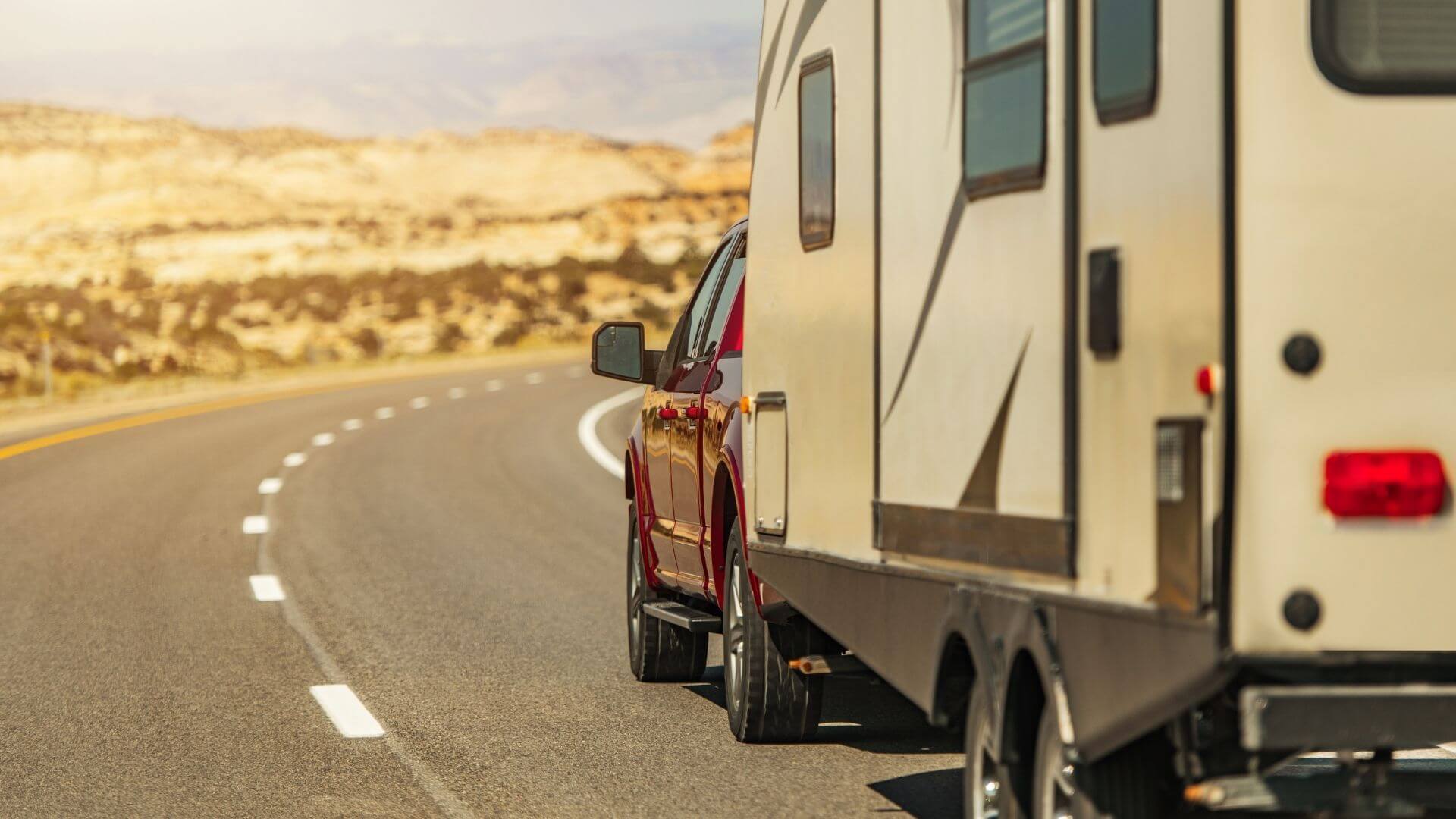 Pickup truck towing a large RV trailer near Stockton, California