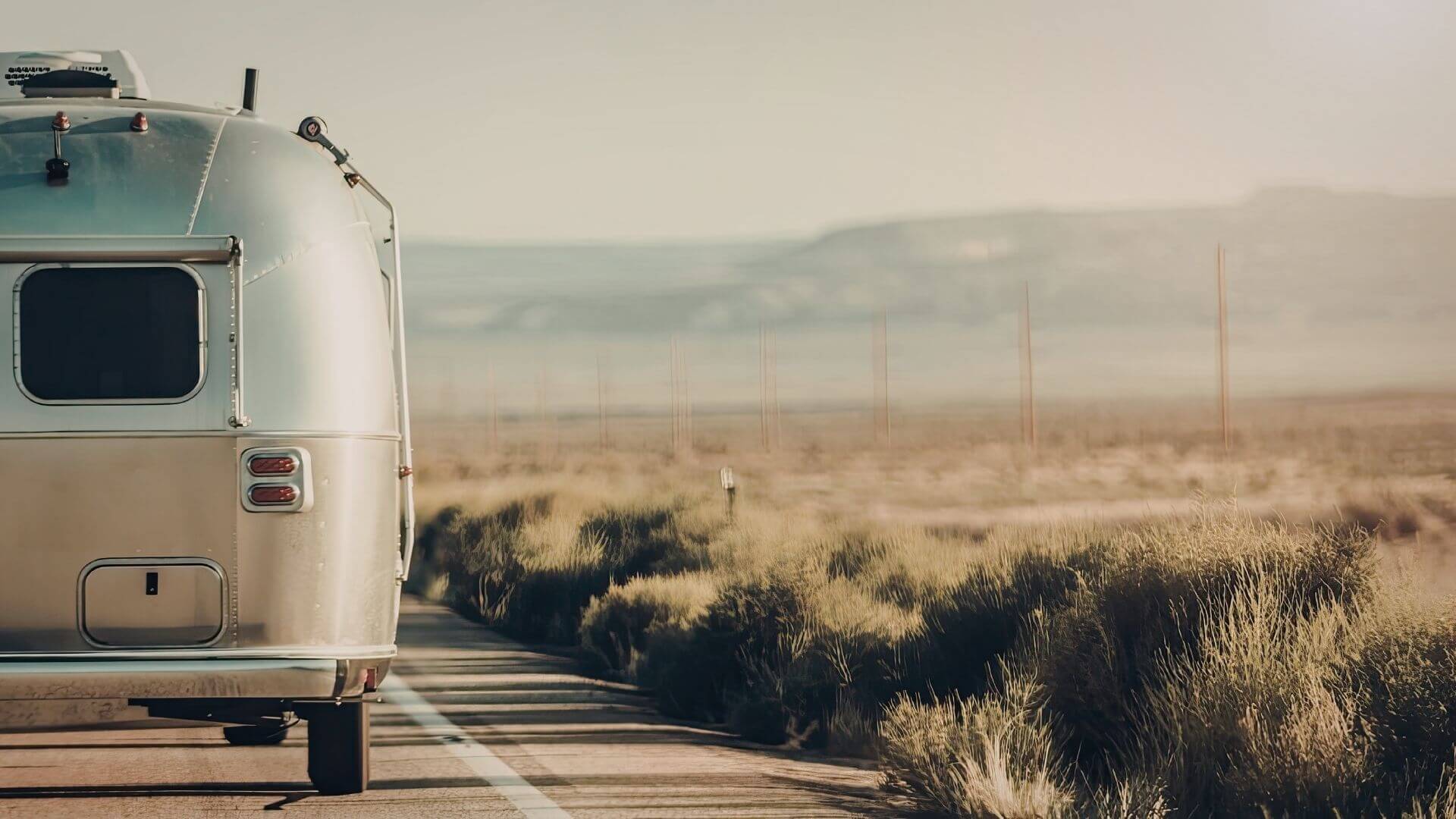 Travel trailer being towed on the highway near Stockton, California